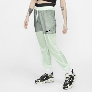 Damskie spodnie z tkaniny Nike Sportswear - Zieleń