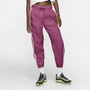 Damskie spodnie z tkaniny Nike Sportswear - Różowy
