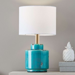 Tekstylna lampa stołowa Cous, ceramiczna stopa