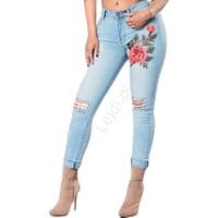 Jeansy z dziurami z haftem Plus size