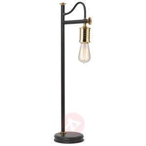 Charakterystyczna lampa stołowa Douille